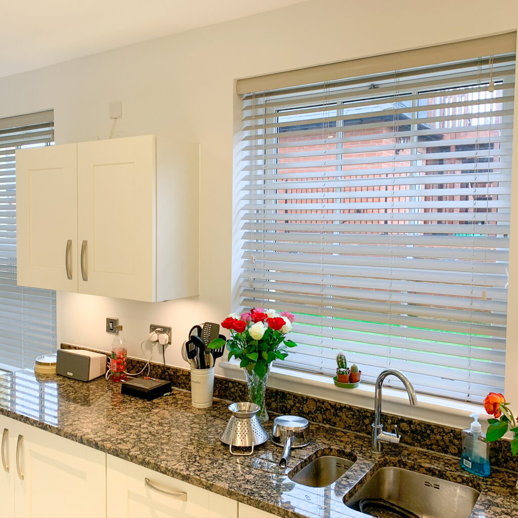 Grey wood Venetian blinds in a kitchen in Winchester Hampshire