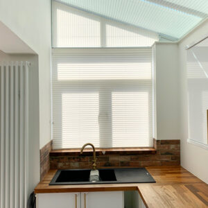 Shaped pleated blinds